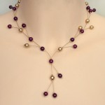 Collier mariage or et bordeaux