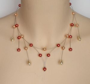 Collier corail, ivoire et pêche